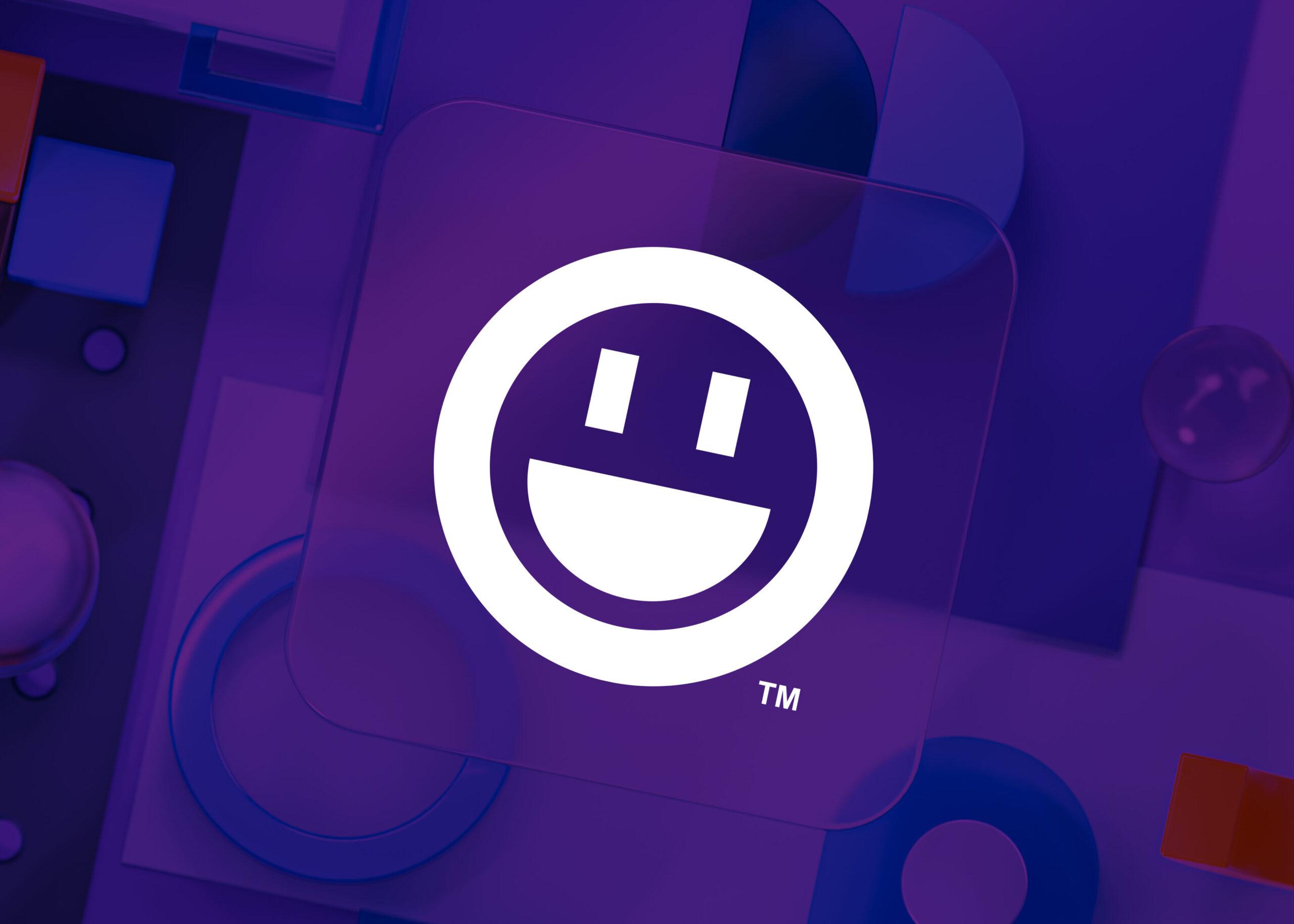 Friendly Creative Studios smile mark on a dimensional purple glass background